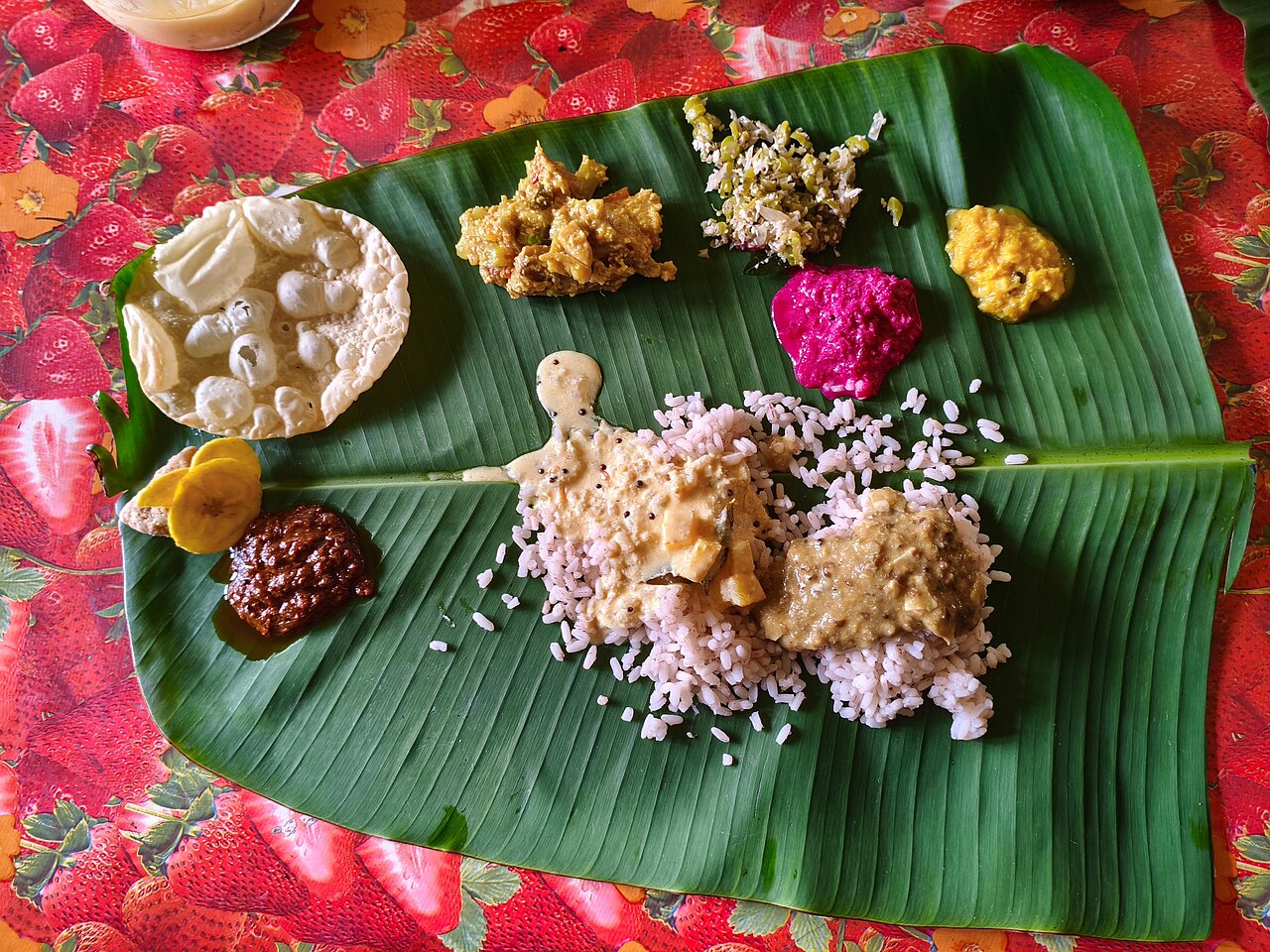 A traditional Kerala meal served on a banana leaf